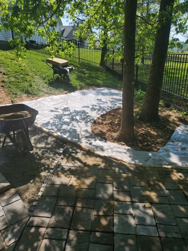 Concrete patio installation and outdoor living space construction by Dave's Construction LLC