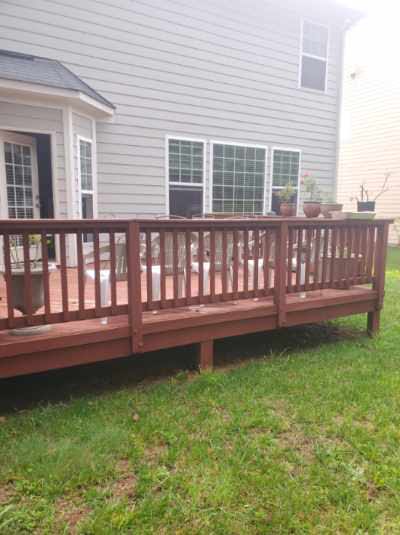 Residential deck repair and wood railing replacement by Dave's Construction LLC
